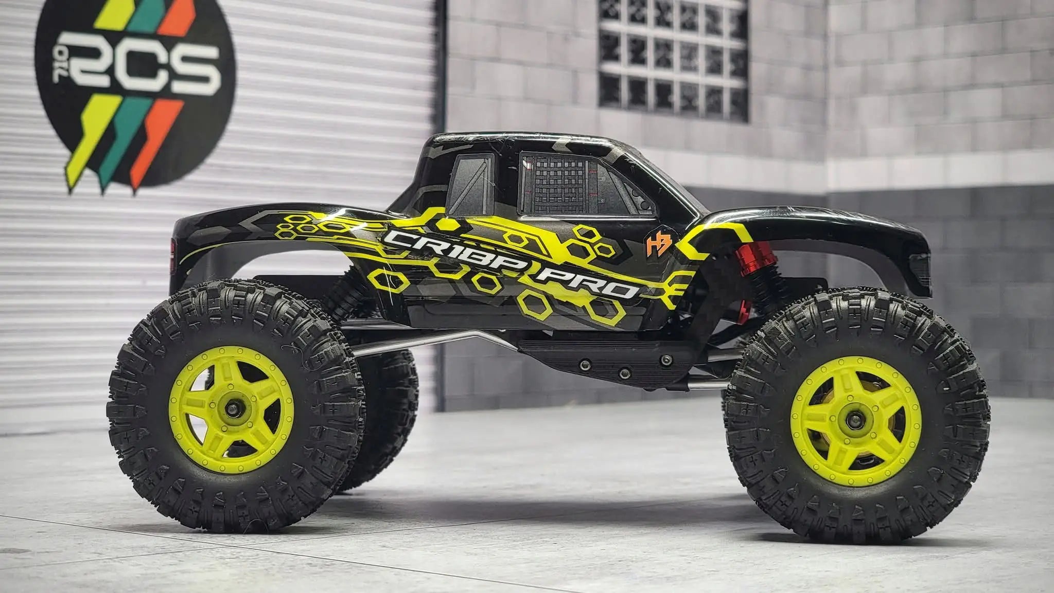 RCSTEVE CR18P Pro RC crawler with yellow wheels and black body, engineered for top-tier micro crawling performance and control.