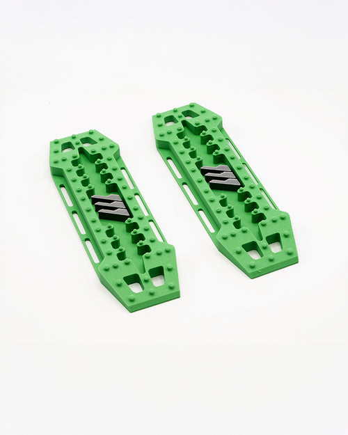 Green 1/10 scale RC traction boards for crawlers, designed for realistic off-road recovery detail.