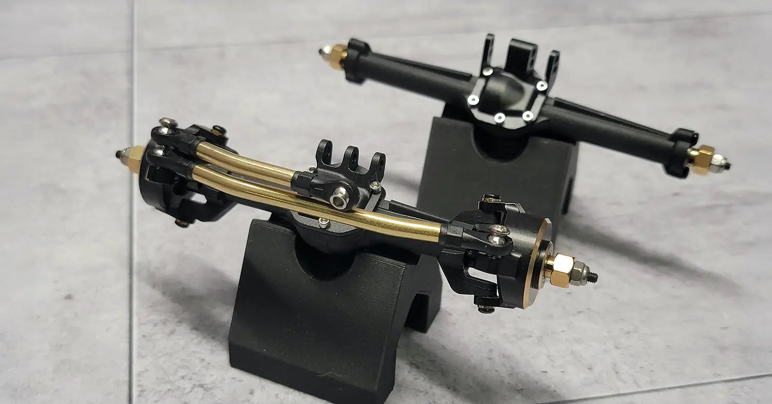 RCSTEVE product reviews showcasing detailed testing of RC crawler parts, including brass links, axles, and performance upgrades.